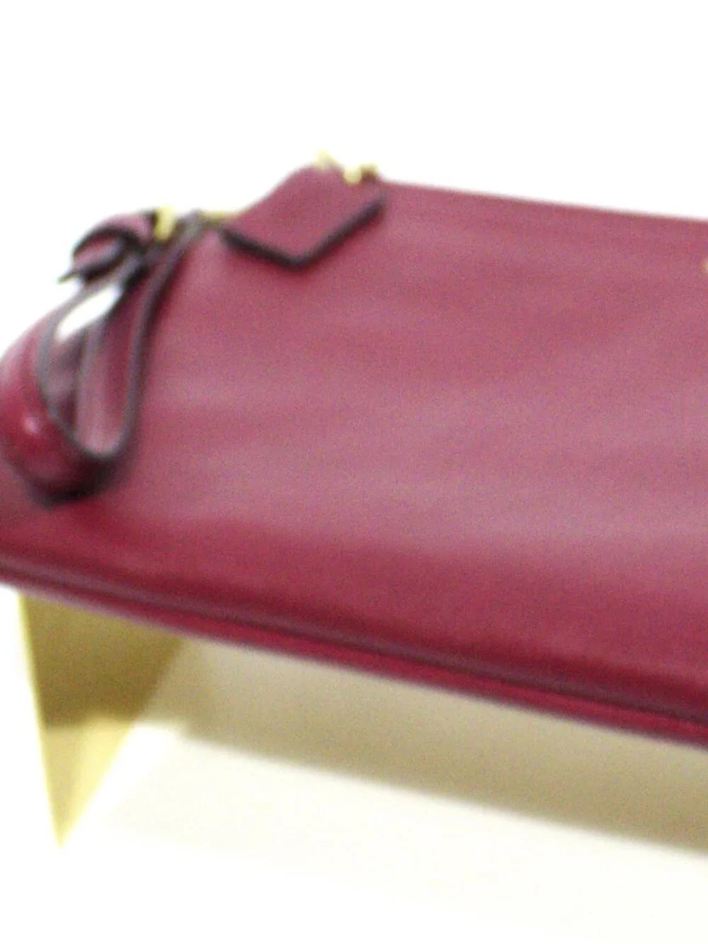 Coach burgundy wristlet